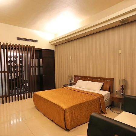 Hua Jia Motel Тайнан Екстериор снимка